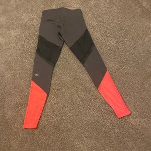 Black/orange Alo leggings